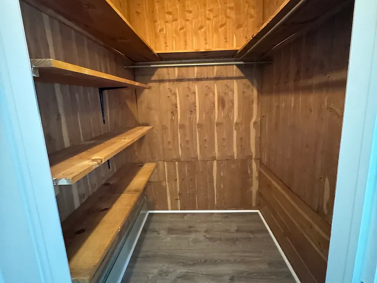 1st closet in primary bedroom