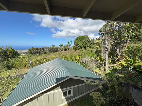 looking northwest over carport
