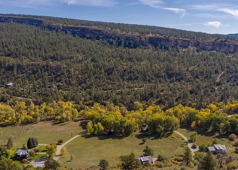 view of the property from Perins Peak Wildlife Area (middle parcel between the 2 drives)