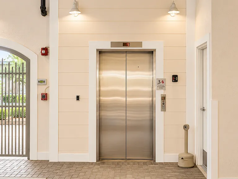 Main secured entrance with elevator access