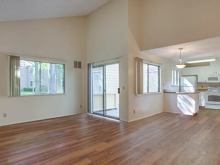 Spacious bedrooms with wood plank flooring