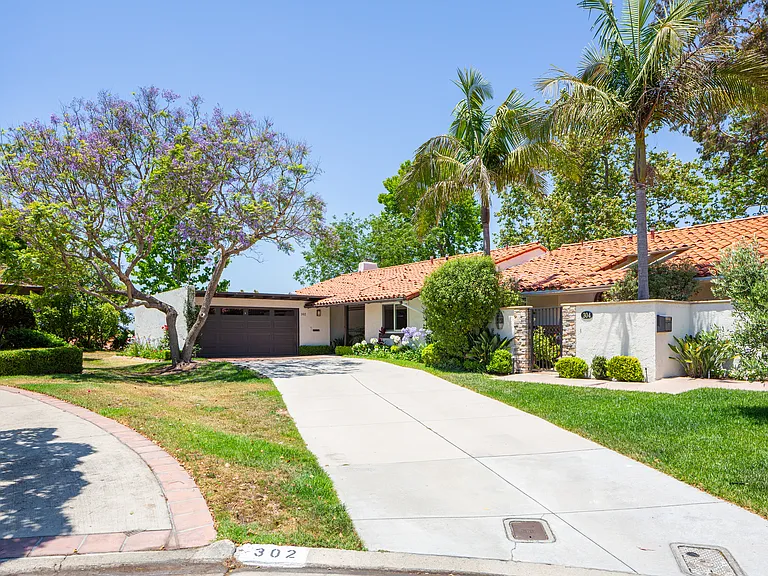 Extra Long driveway directs you to a home of serenity.