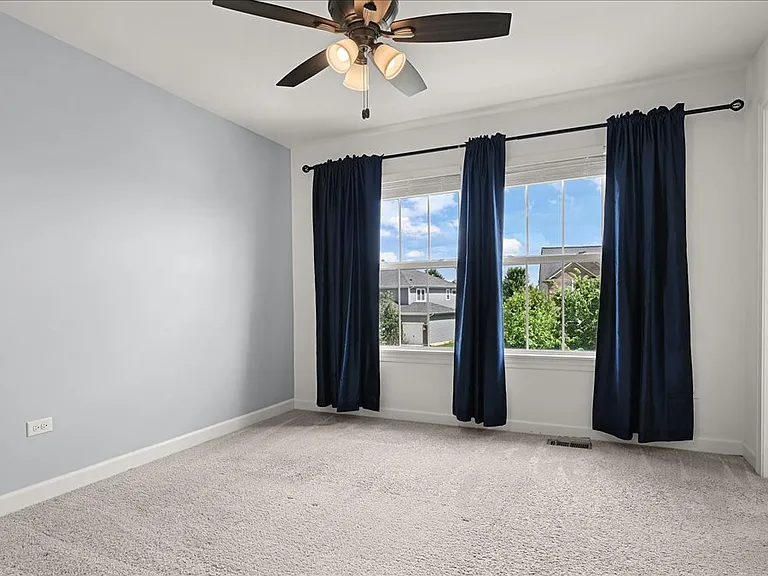 Second of four bedrooms with it's own attached full bathroom. Perfect for in law suite, care giver living arrangement, or guest room.