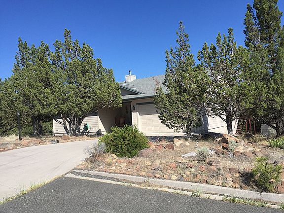 5219 Hill Dr. Shaded by tree