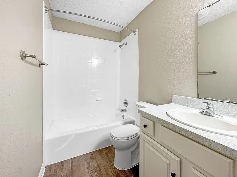 Elegant bathroom with contemporary finishes and ample counter space.