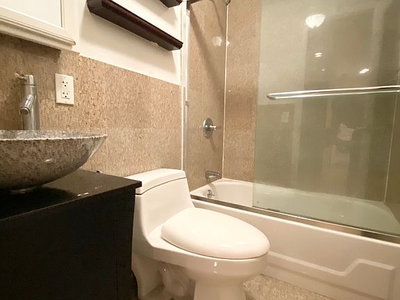 5th image of 87 E 3rd St APT 10
