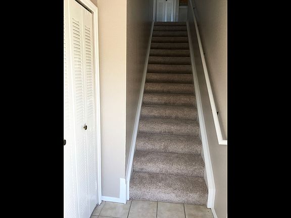 Foyer with large storage closet