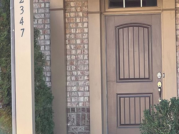 Front entry with full-size covered porch.
