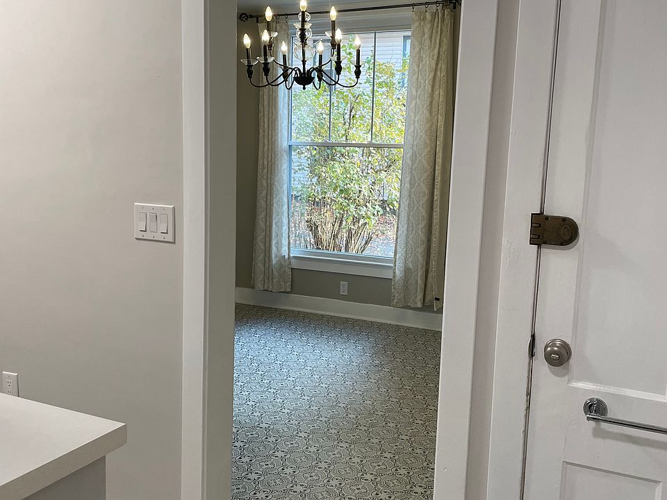 Second door leads to interior staircase and basement