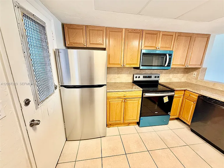 1591 NE Miami Gardens Dr #205 — Photo 13