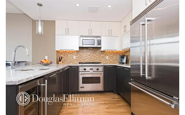 Sold by Douglas Elliman | media 13