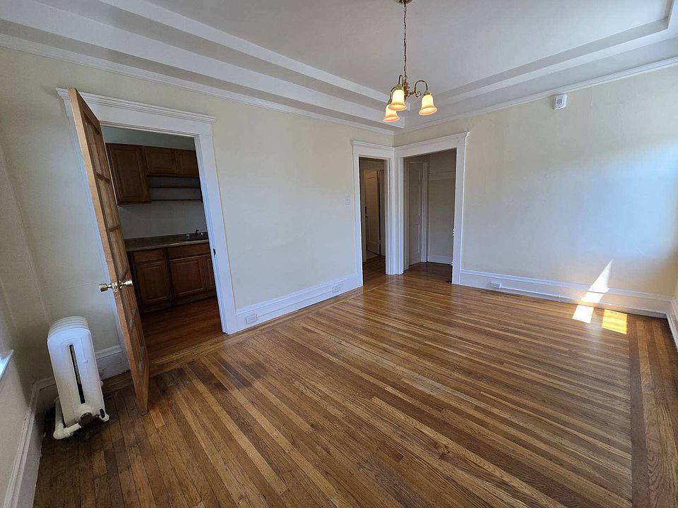 Living room showing door entrance to kitchen.