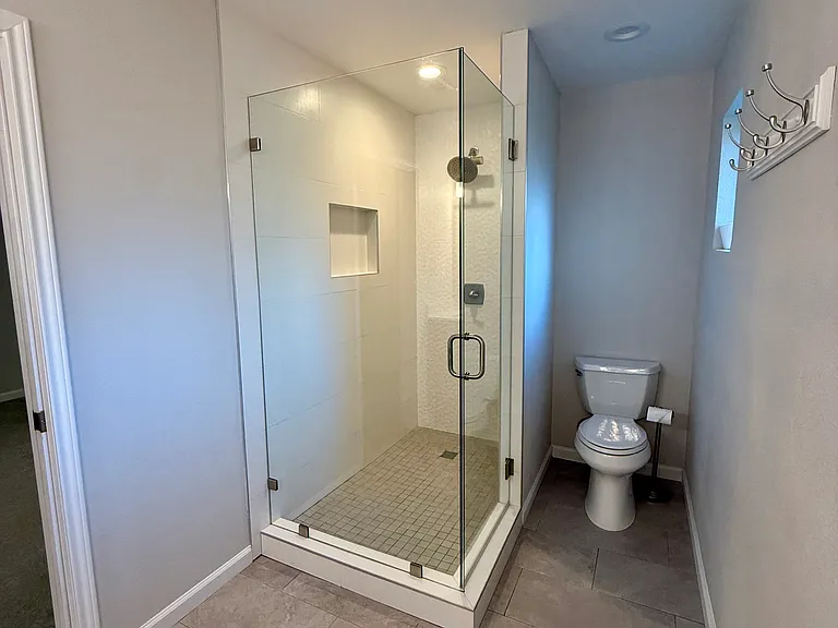 Primary bathroom. Large walk-in shower.