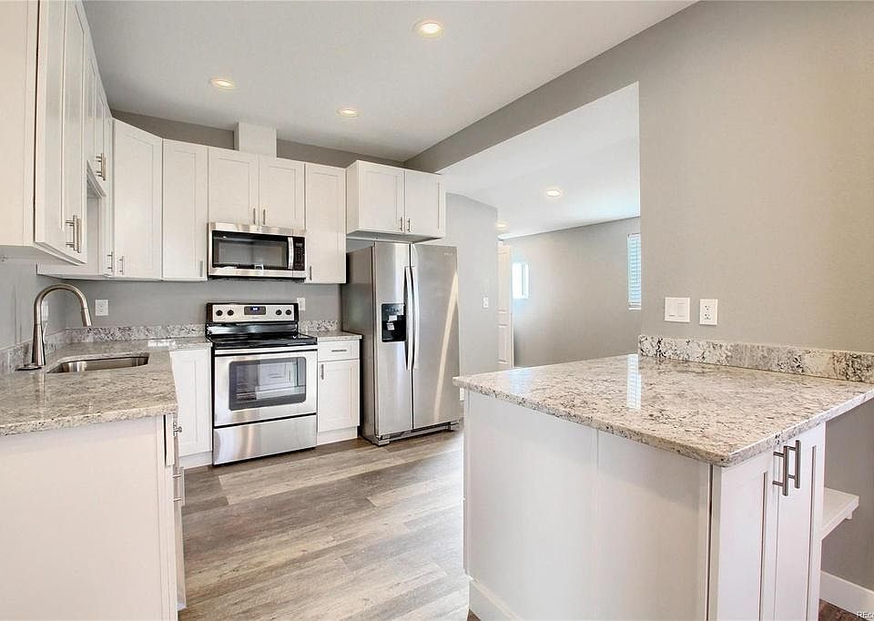 Remodeled kitchen with new stainless appliances and granite counter-tops