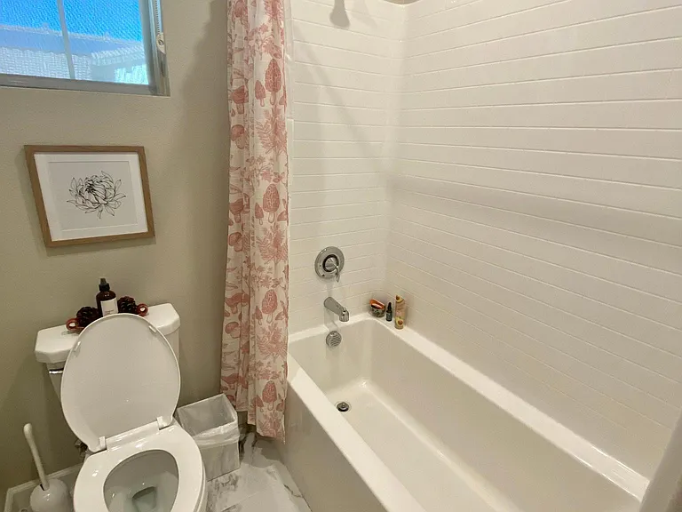 Part of shared bathroom separated by door