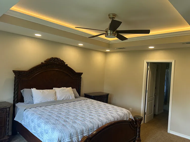 Owner Suite Bedroom with recess, lighting, as well as a coffered lighting in the Crawford ceiling