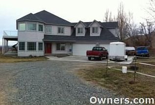 front of house, cement parking on side