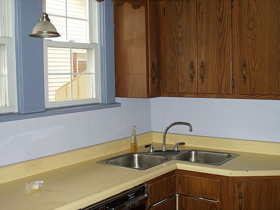 Kitchen wiith butterfly corner sink.