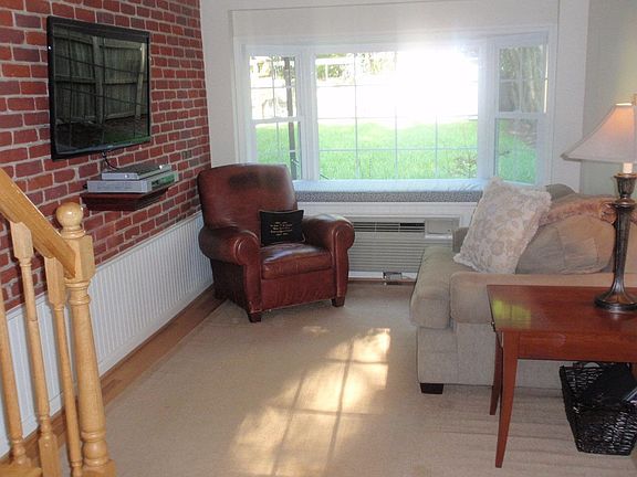 Current owners thoughtfully converted this attached garage into a GREAT den!!