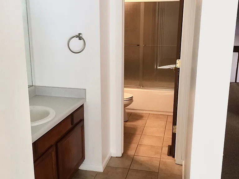 Bathroom configuration. Full hall bath connected to Primary bedroom sink