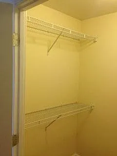 Walk-in Closet between Bedroom and Bathroom