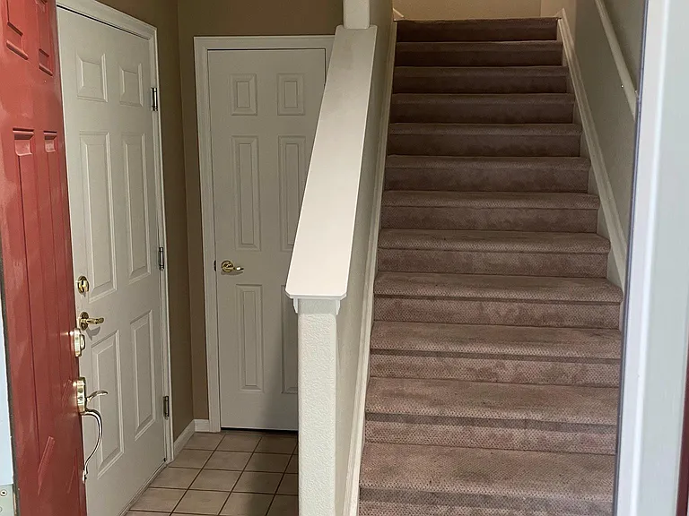 Entrance from front door or garage with coat closet