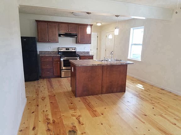 Living area and kitchen from front door