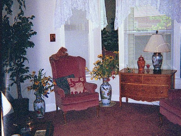 Part of the attractive, high-ceilinged formal parlor.