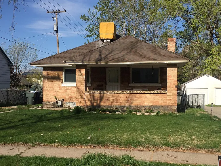 Dated Front picture. The home is having new landscape in the front