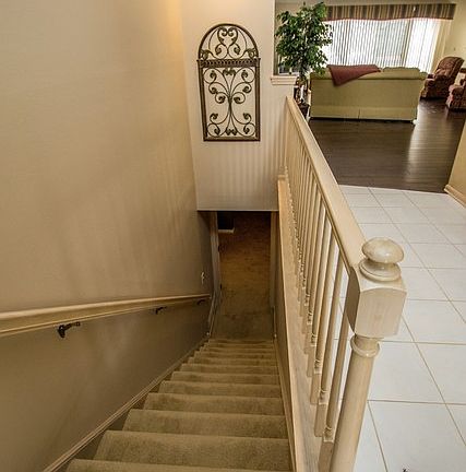 Foyer and steps to basement