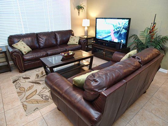 WH6P2540AB-family-room-with-wide-flat-screen-tv