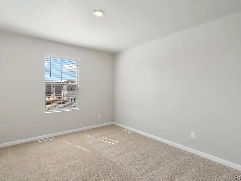 2nd guest room with sliding door closet