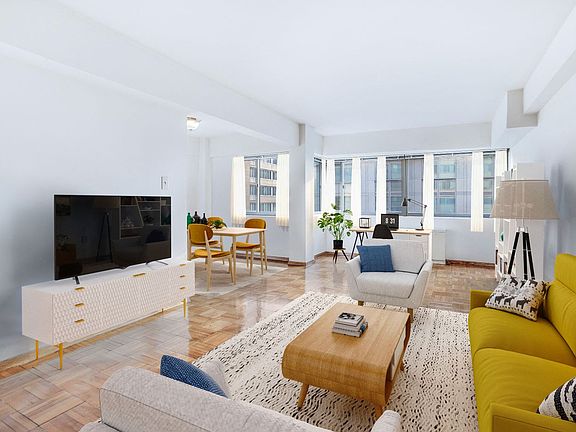 Living and dining area (virtually staged)