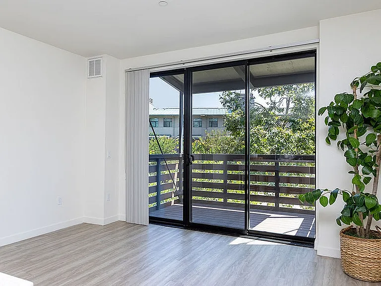 Large Living Area With Spacious Balcony