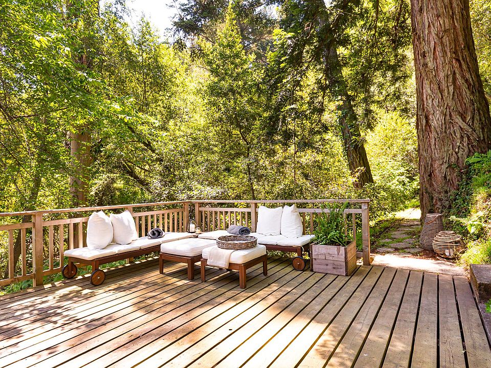 Lounging deck off downstairs. Sweet path alongside property ends at Wainwright street & into town.