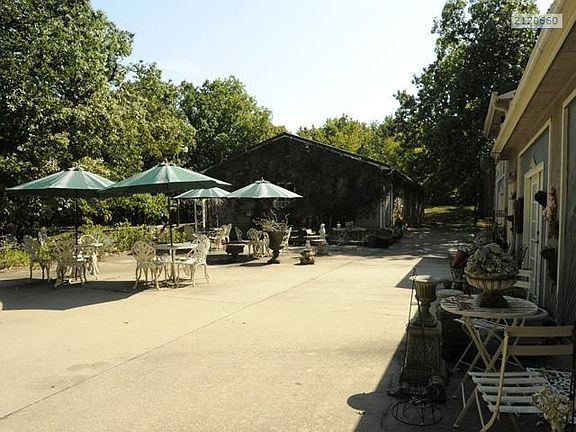 Patio outside separate buildings. Two 3000 sq ft buildings. Possible business opportunity!