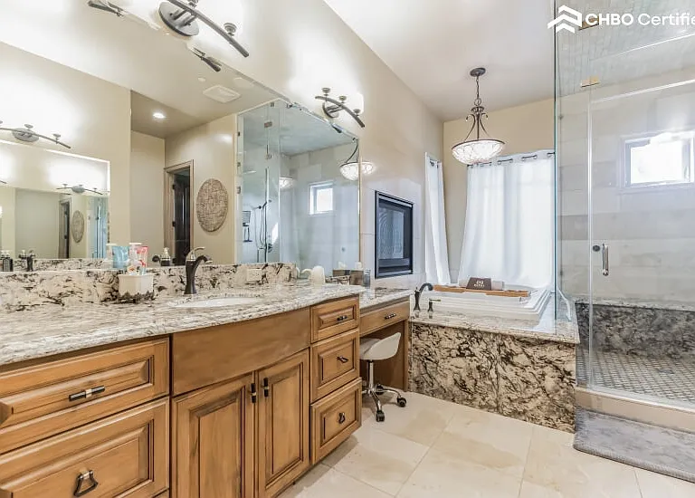 master bathroom with 2 personal sinks