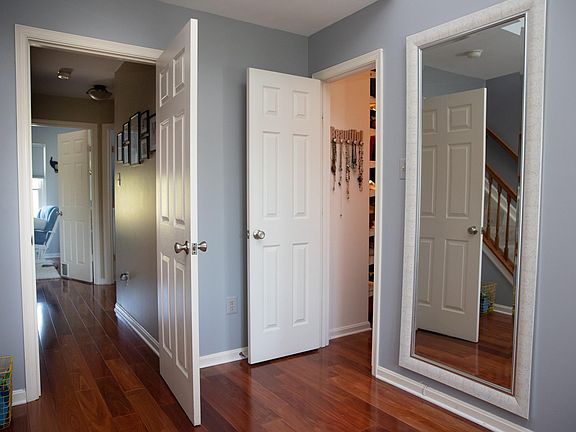 Master bedroom entry way and door to walk-in closet.