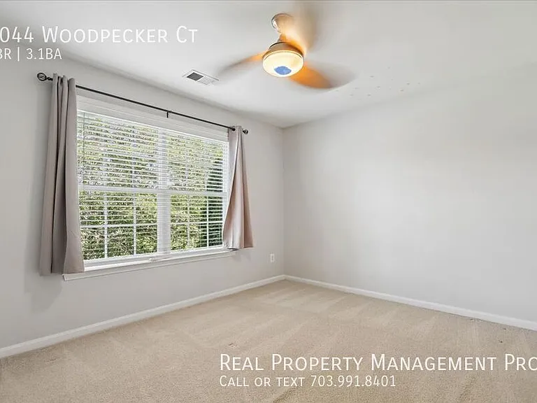 9044 Woodpecker Ct — Photo 24