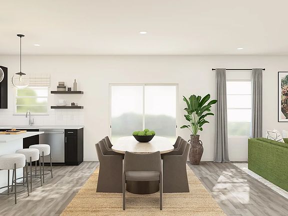 Cozy dining area adjacent from kitchen