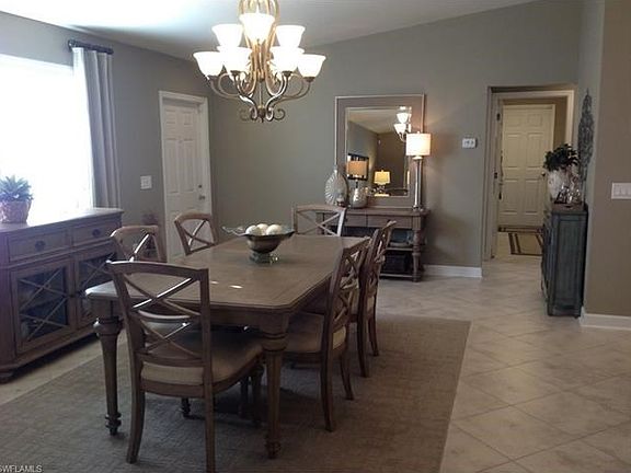Upgraded tile on the diagonal- plantation shutters thru-out the home.