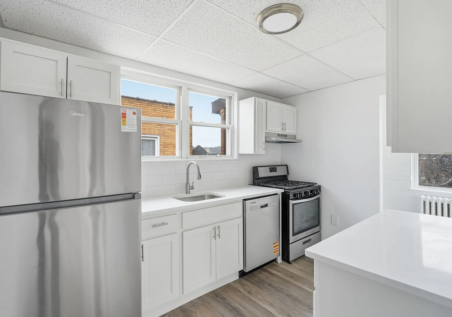 Updated Apartment Homes Near Downtown | 126 W 9th Ave — Photo 1