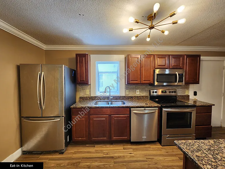 1907 Henderson St — Photo 13