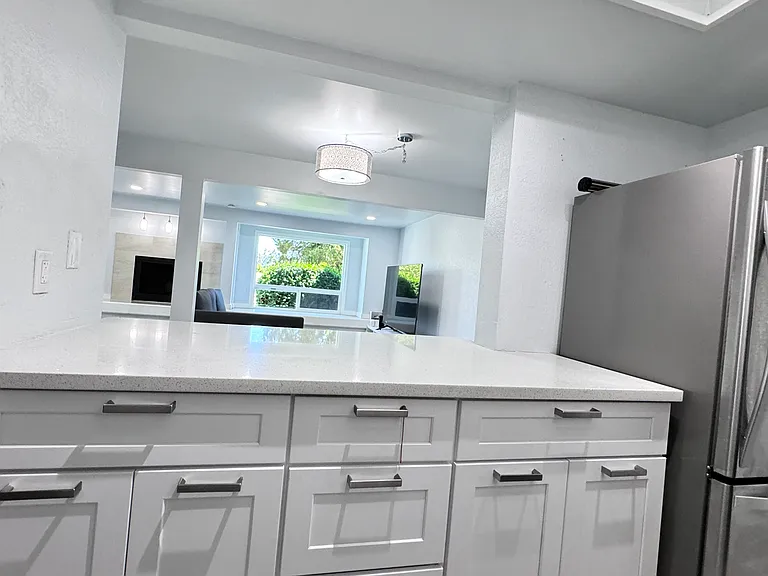 Recently remodeled kitchen, with quartz countertop