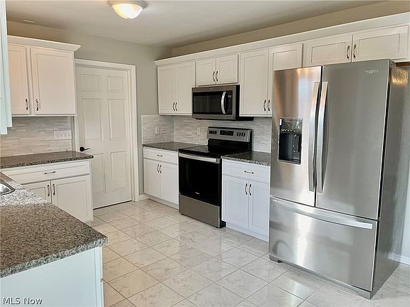 5th image of 3384 E Center St