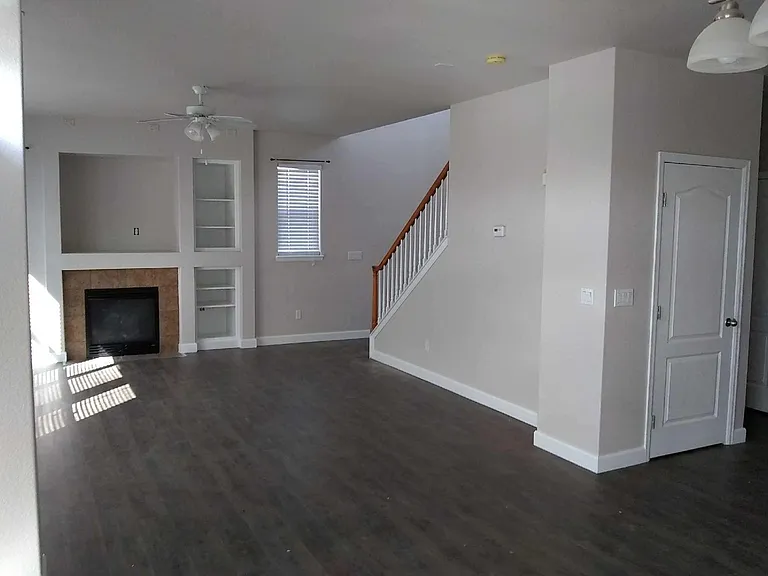 new flooring, paint, and baseboard moldings