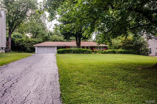 THIS HOUSE IS A TEAR DOWN - NEW HOME COMING SOON