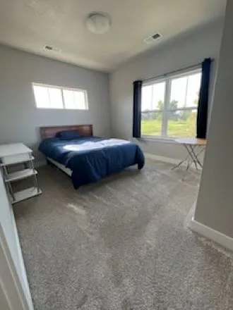 Second bedroom - full size bed, golf course view