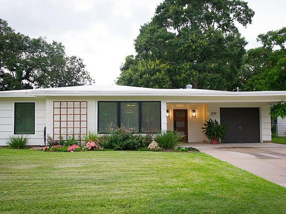 Beautiful new exterior with a mid-century modern flair