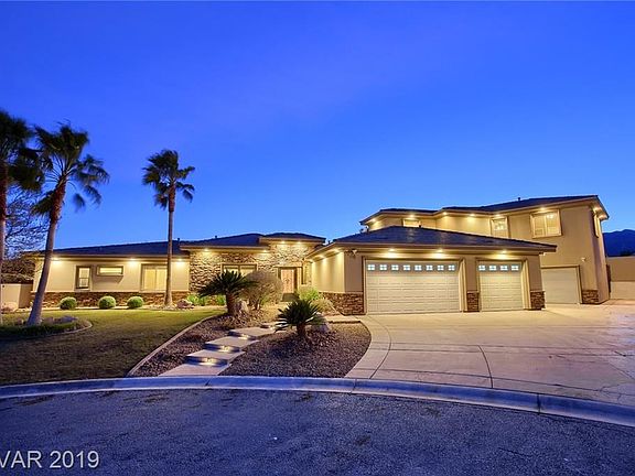 Gorgeous Custom Home w/ Backyard Paradise! It Lives Like A 1 Story w/ Downstairs 4BR including Double Masters, Den, Theater, Fam